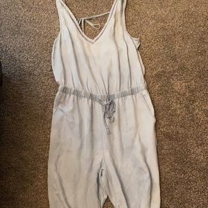 Dex jumpsuit. Light denim color. So cute ! V back detail. Size large